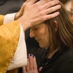 Tammy Peterson enters into the Catholic Church during an Easter Vigil Mass in Toronto, Ontario, Canada. Screenshot: Youtube, EWTN